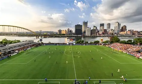 Highmark Stadium pitch and Pittsburgh skyline